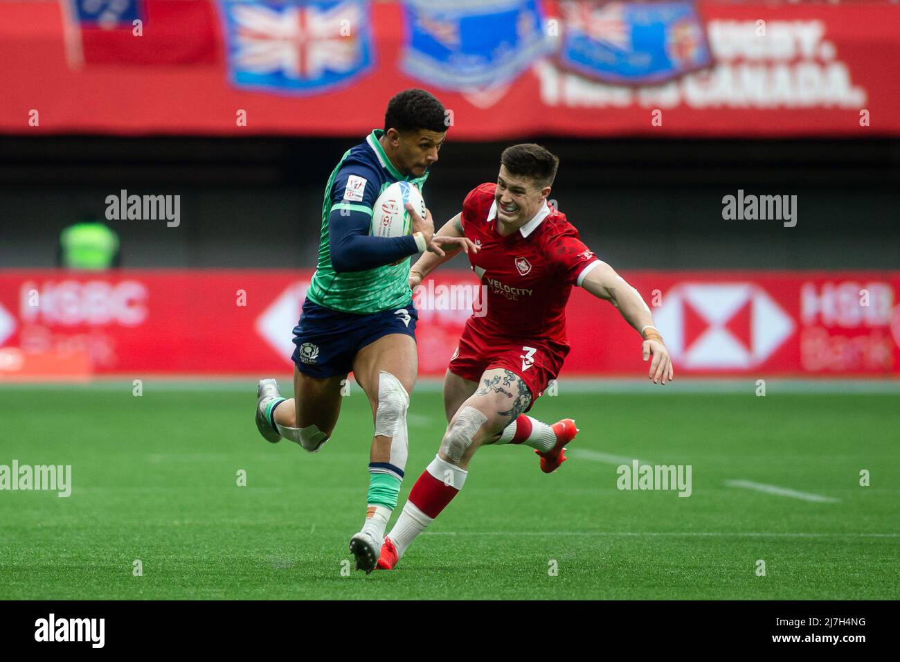 Vancouver, Canada, April 17, 2022: Jacob Henry (left, holding ball) of Team Scotland 7s in action against Nicholas Allen (right) of Team Canada 7s during Day 2 of the HSBC Canada Sevens at BC Place in Vancouver, Canada. Canada won the match with the score 26-22. Stock Photo