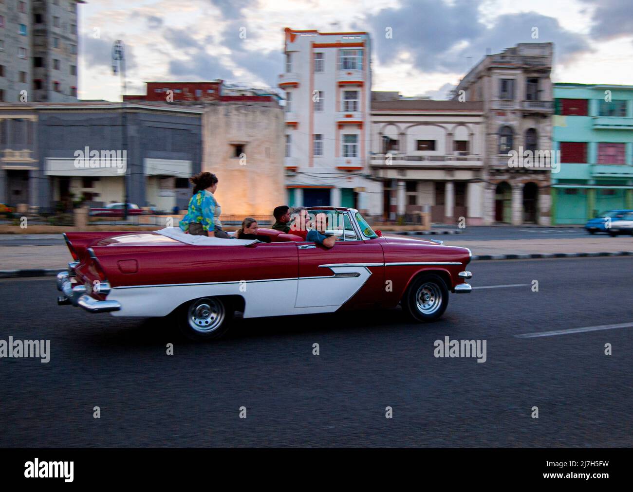 City tour through the streets of Havana, Cuba in an old American made classic car. Stock Photo
