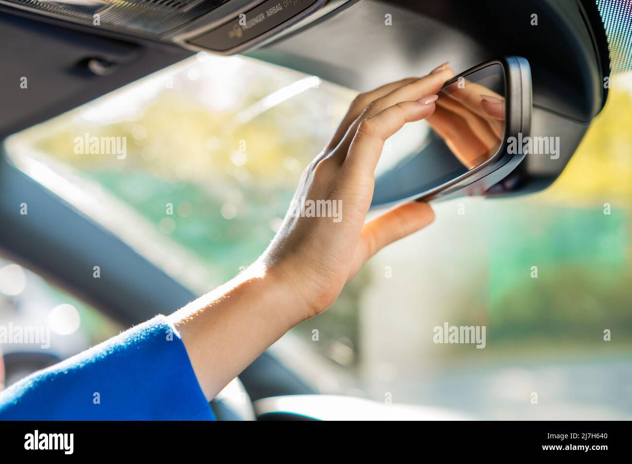 Woman's reflection rear view mirror hi-res stock photography and images ...