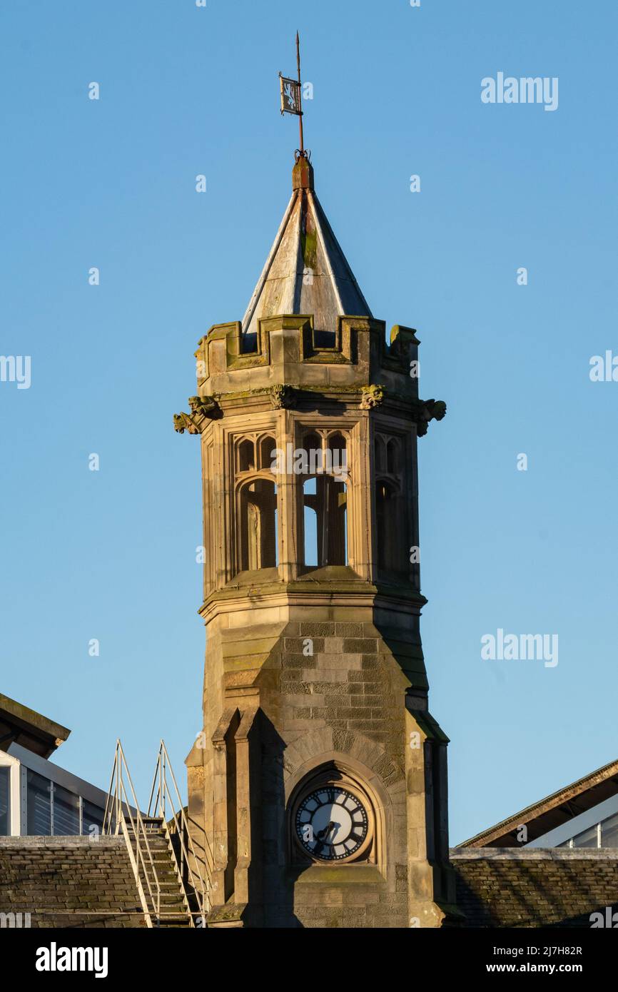 Architectural detail of the clock tower on the Carlisle Train Station.  Also known as the Carlisle Citadel this building is Grade ll listed. Stock Photo