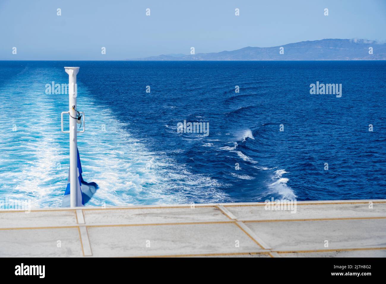 Sailing in ferry boat somewhere in the Aegean sea, in the Cyclades islands, among the islands of Paros, Naxos and Santorini, in Greece, Europe. Stock Photo