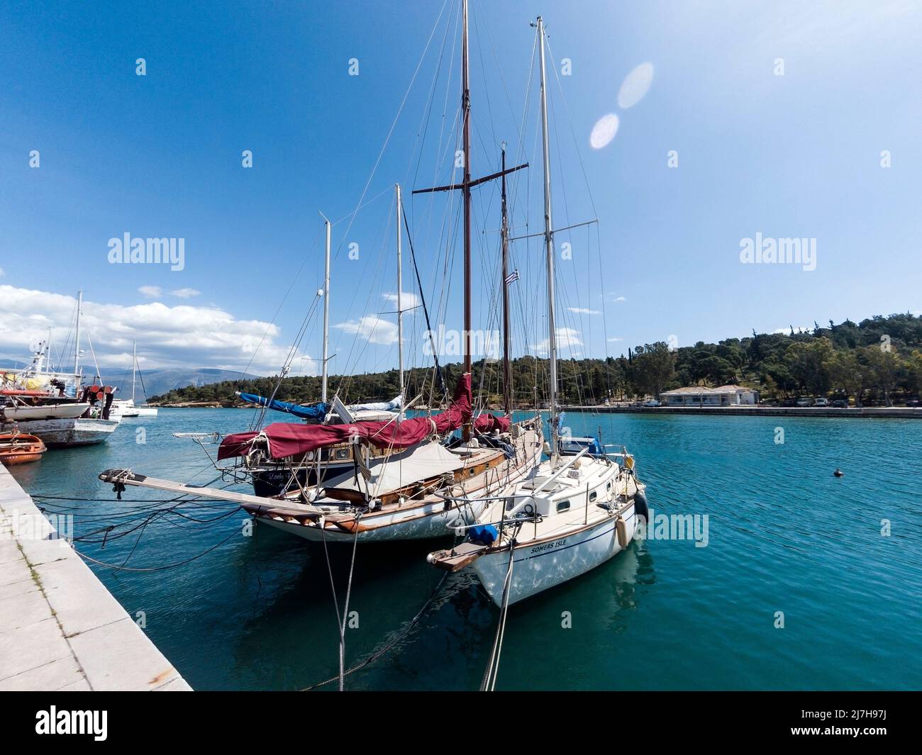 Private cruising yachts anchored in the small port of Galaxidi, a picturesque town of great naval tradition in central Greece, Europe. Stock Photo