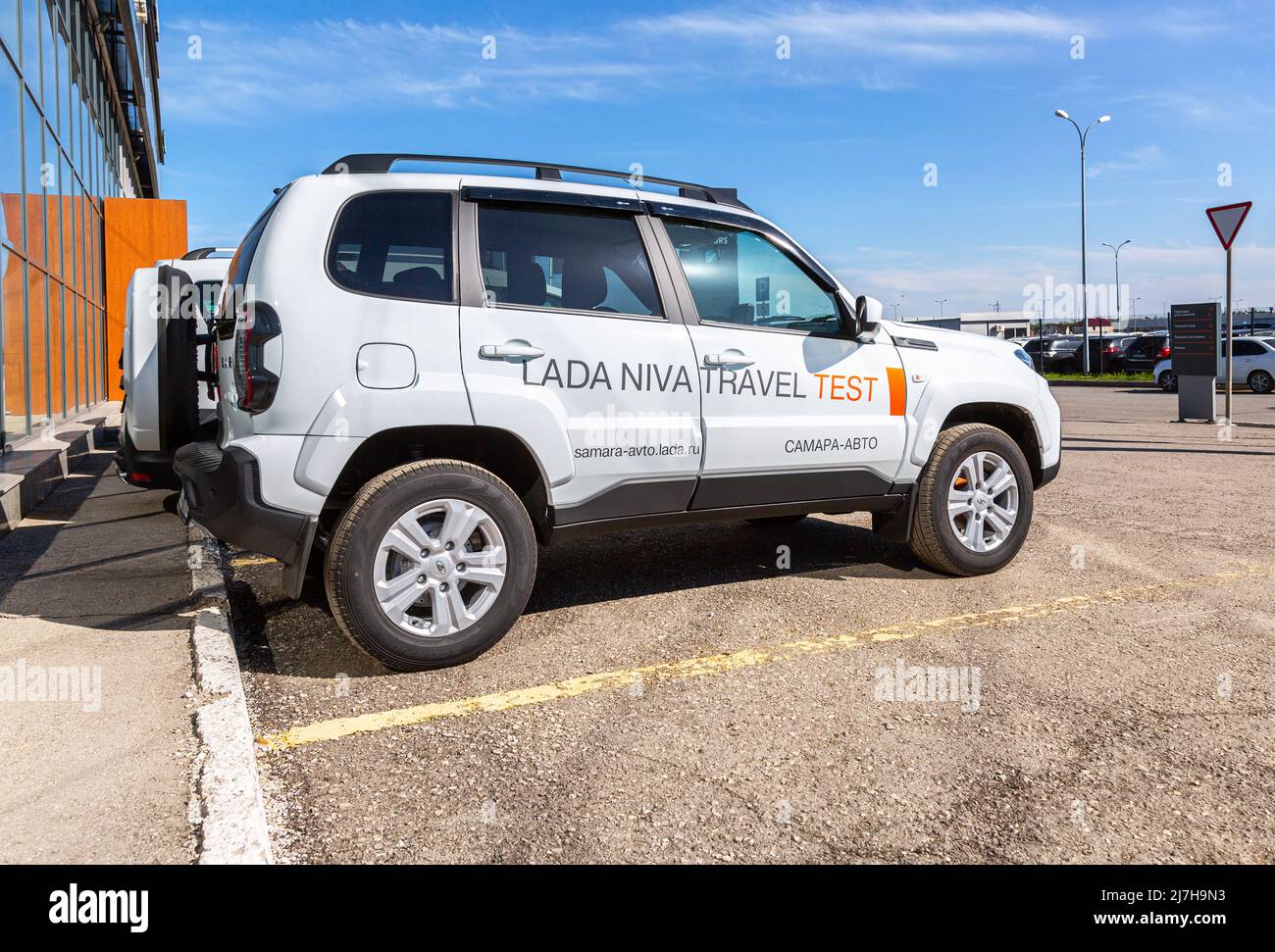 Samara, Russia - May 07, 2022: Brand new offroad Lada Niva Travel vehicle next the office of official dealer Stock Photo