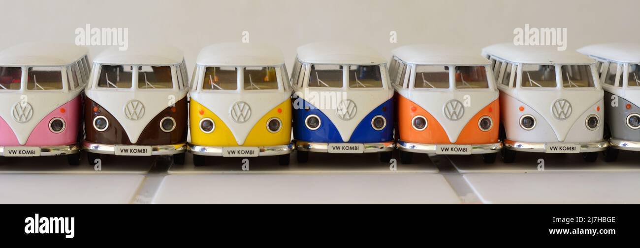 Diecast, Van. Iron miniature of vans of various colors, Brazil, South America, front view, selective focus on white table on white background, zoom, i Stock Photo