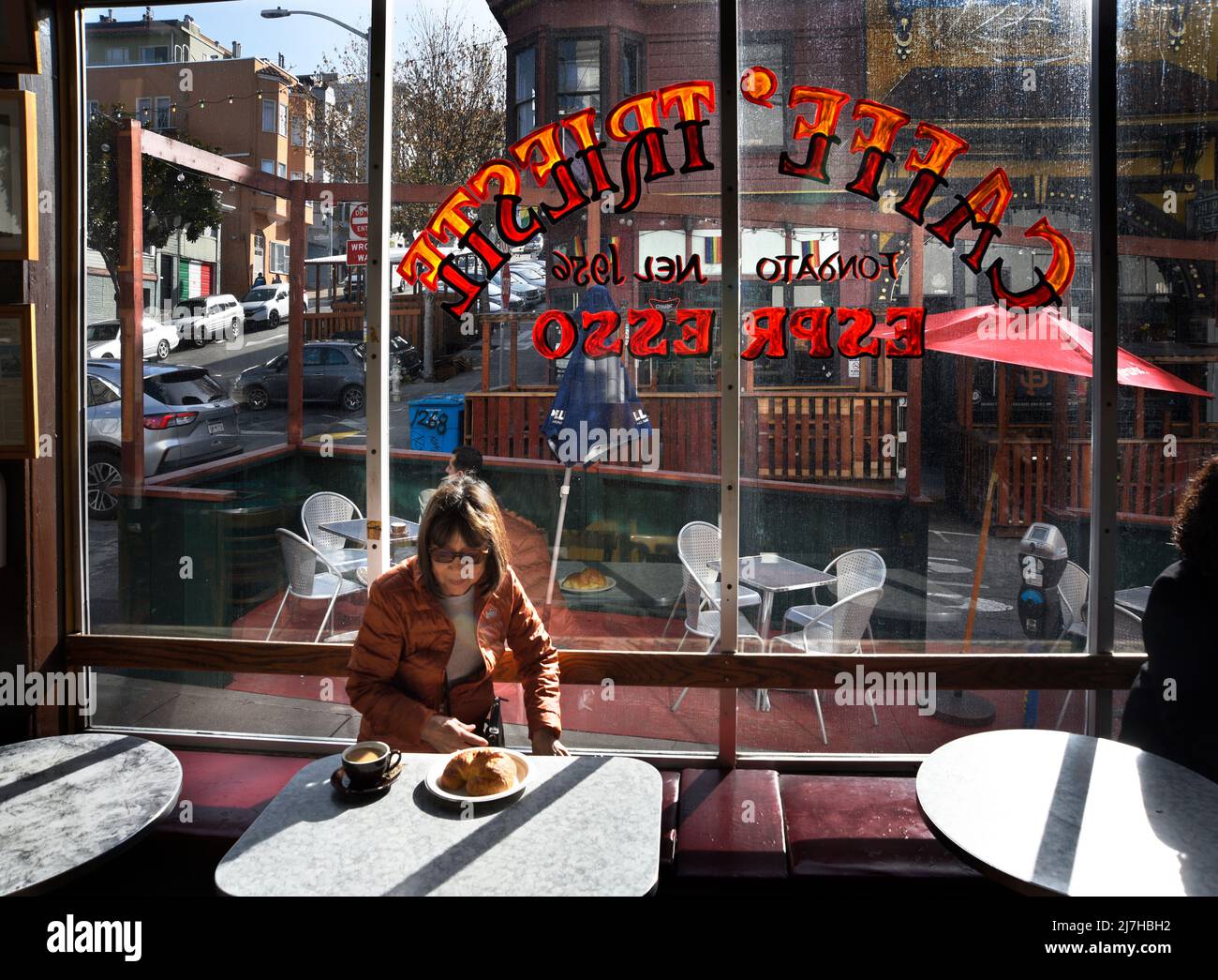 Customers enjoy coffee, espresso and pastries at the iconic Caffe