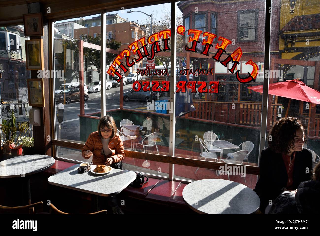 Customers enjoy coffee, espresso and pastries at the iconic Caffe