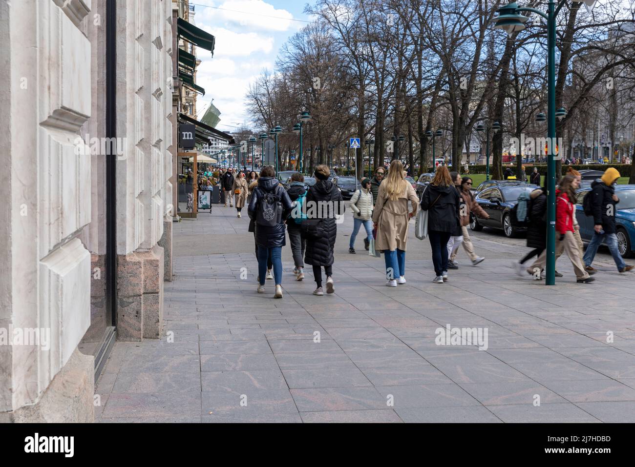 Tourists walking on Esplanade downtown Helsinki on a spring day Stock ...