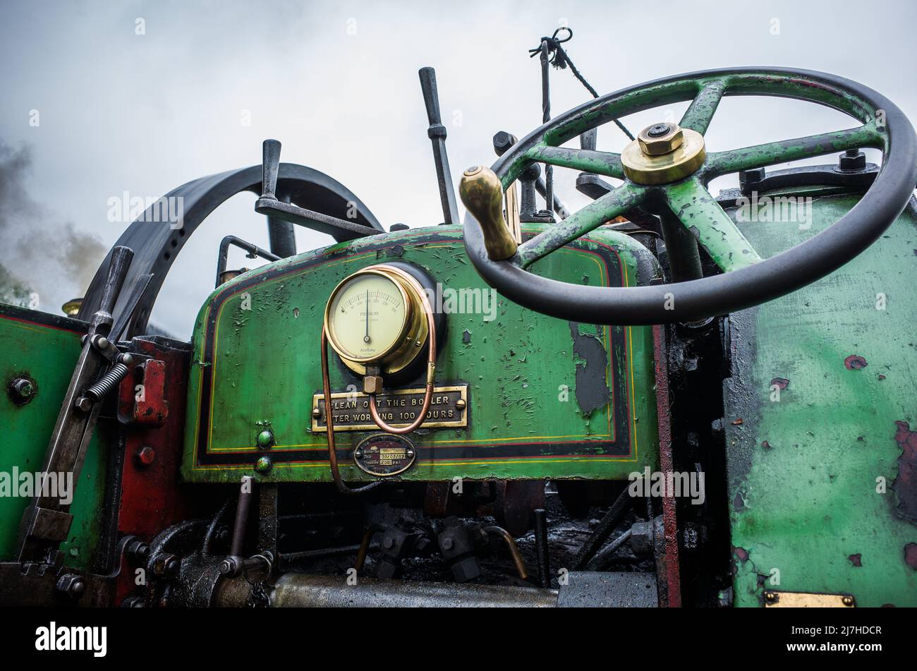 Steering wheel and controlled of a steam powered traction engine. Stock Photo