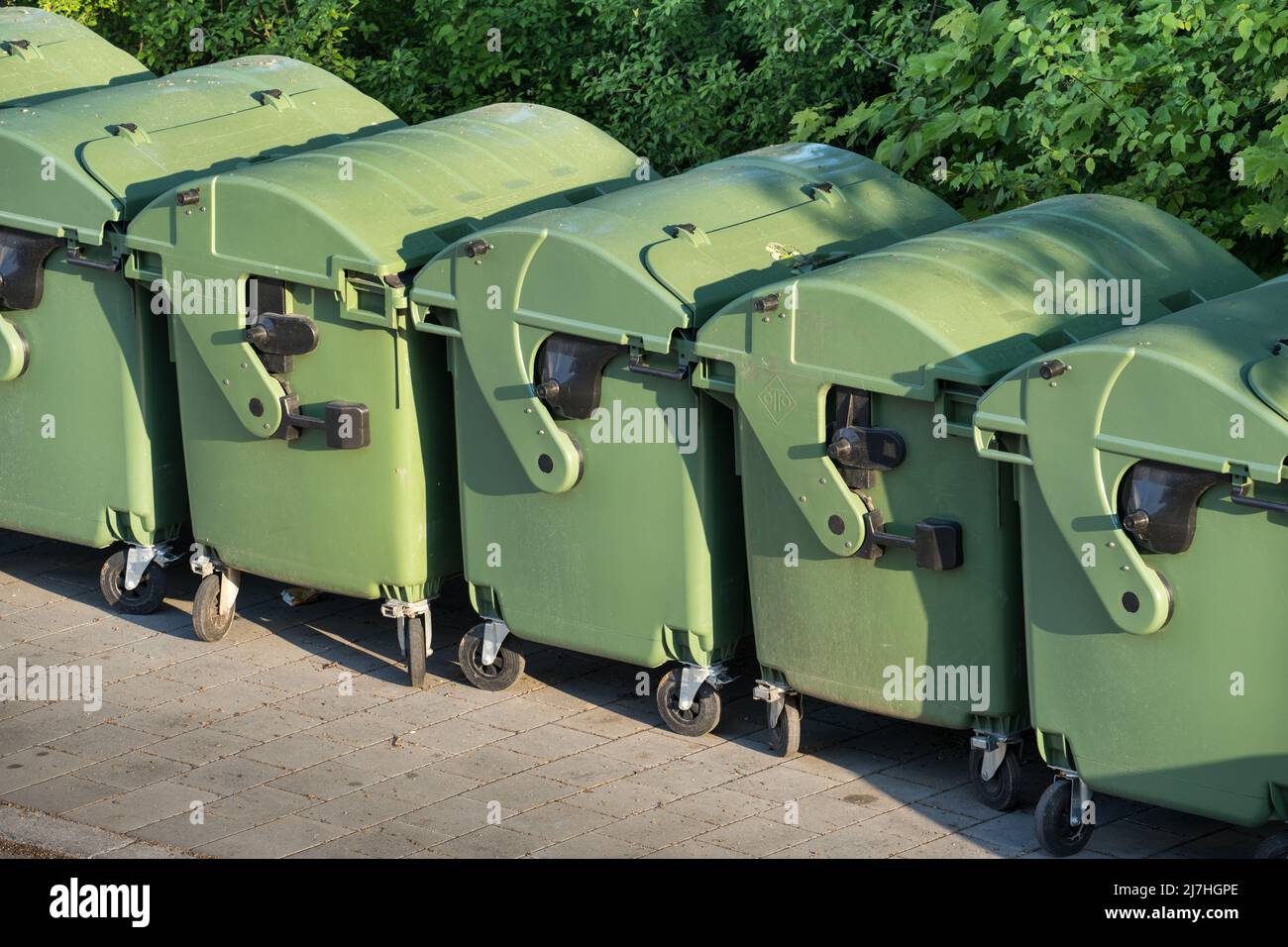 The litter waste bin containers in which the waste was collected are ready for removal or emptying. Stock Photo