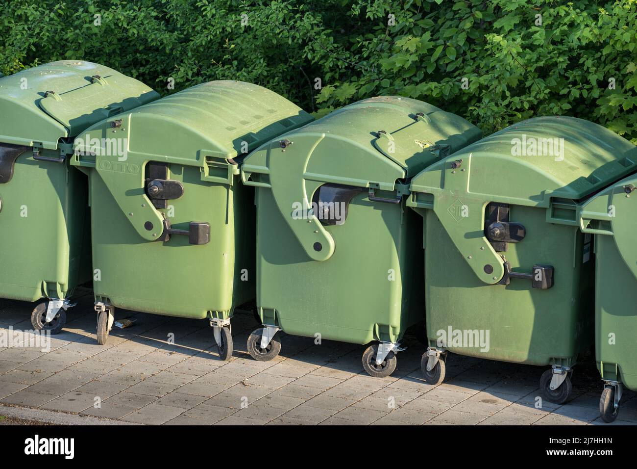 https://c8.alamy.com/comp/2J7HH1N/the-litter-waste-bin-containers-in-which-the-waste-was-collected-are-ready-for-removal-or-emptying-2J7HH1N.jpg