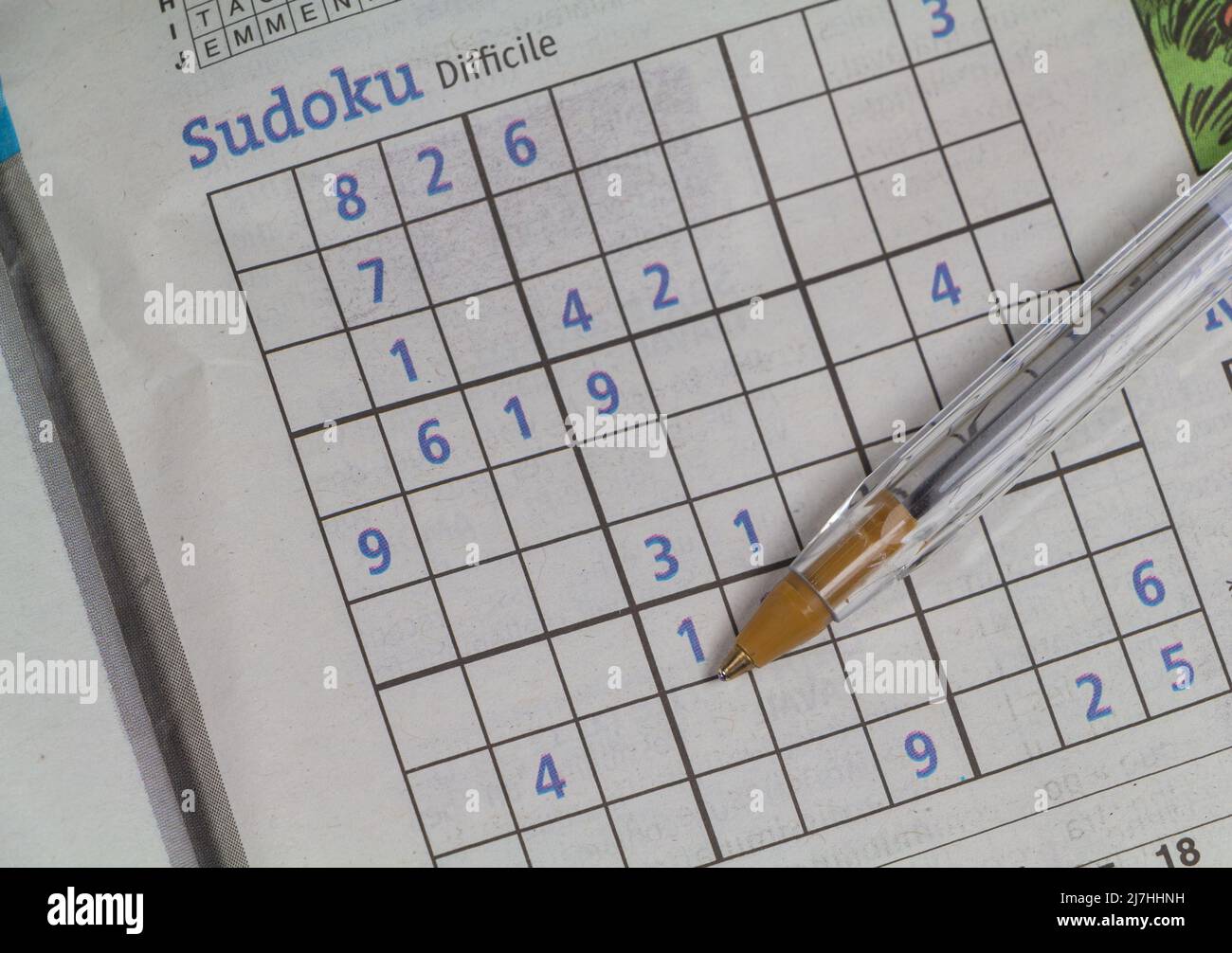 Difficult sudoku game written in french language in a newspaper Stock Photo