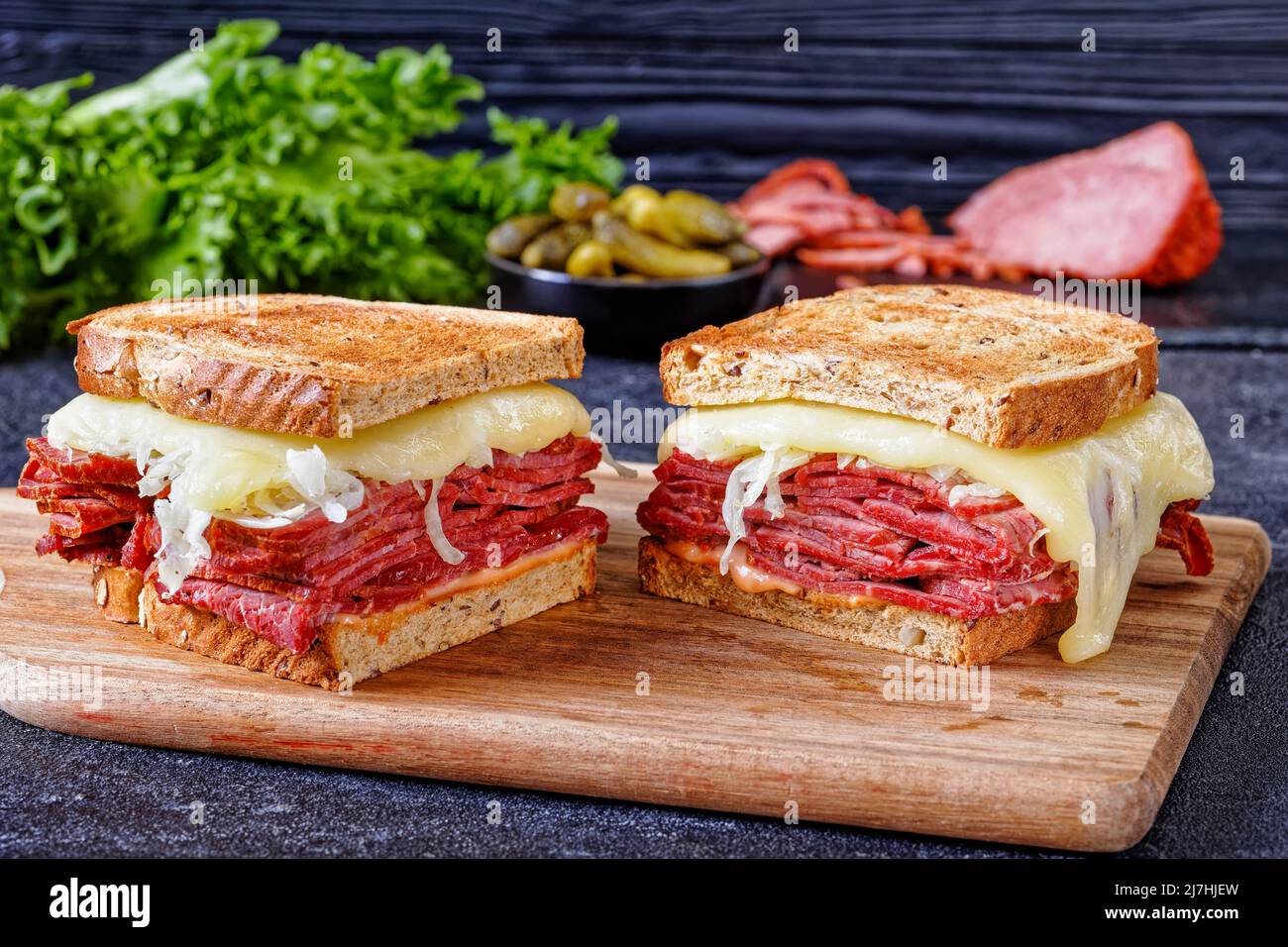 reuben sandwich with rye bread thinly sliced corned beef, sauerkraut