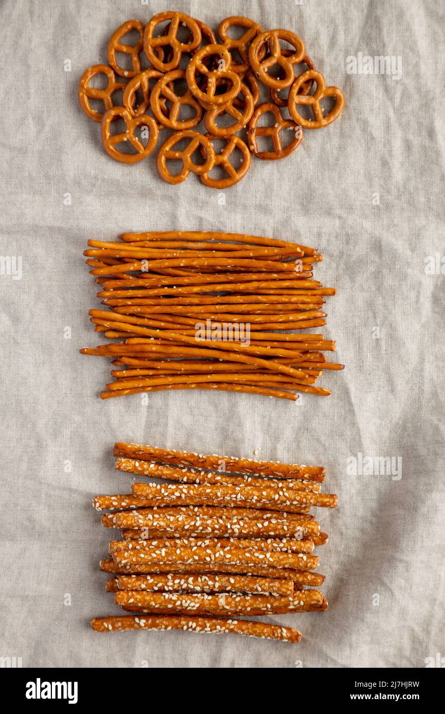 Crunchy Salty Baked Pretzel Sticks, Pretzel Rods and Pretzel Crackers, top view. Flat lay, overhead, from above. Stock Photo