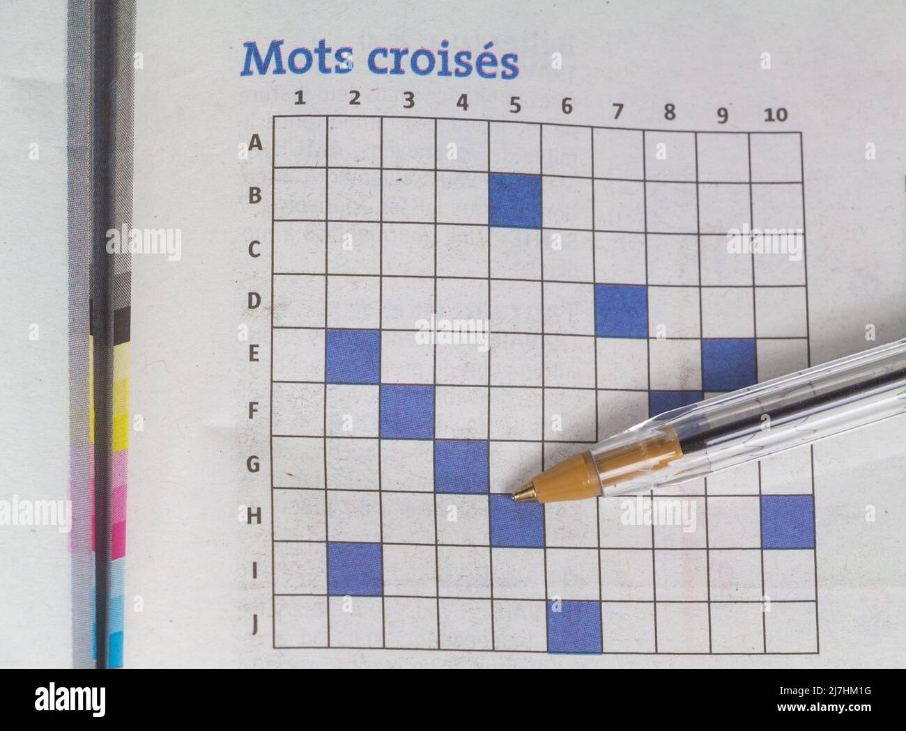 Crossword puzzle in a newspaper and pencil Stock Photo