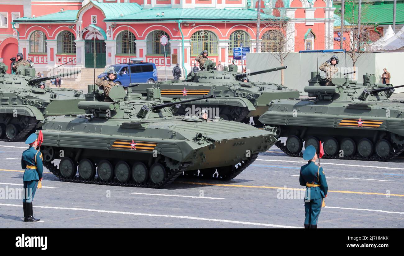 Moscow, Russia, May 2022: Infantry fighting vehicles BMP-2M are passing by Red Square on rehearsal of the military parade. Stock Photo