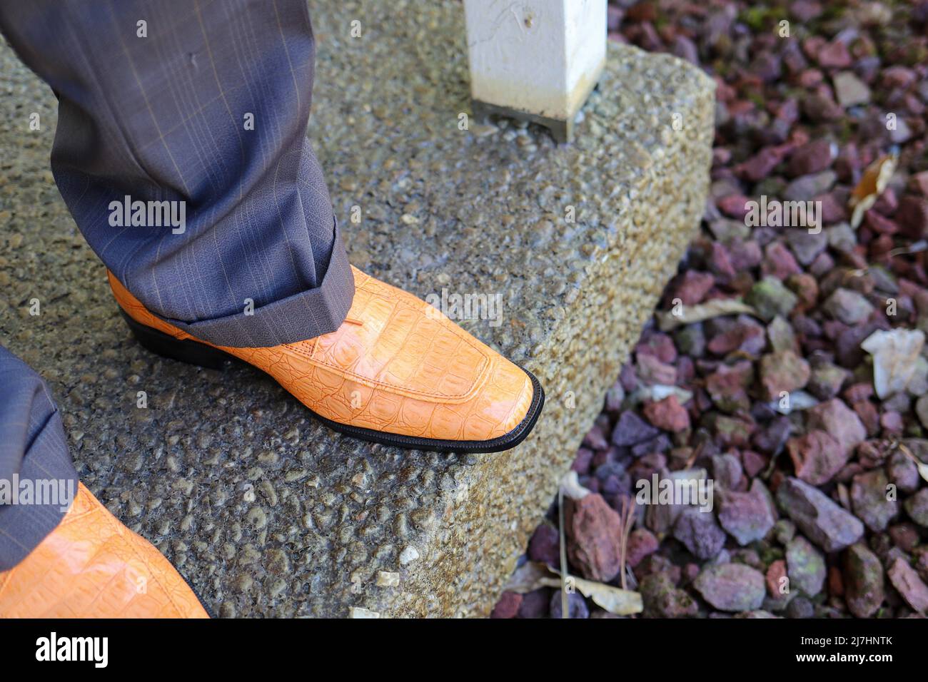 Low Section Of  Man  Wearing Dress  Shoes Stock Photo