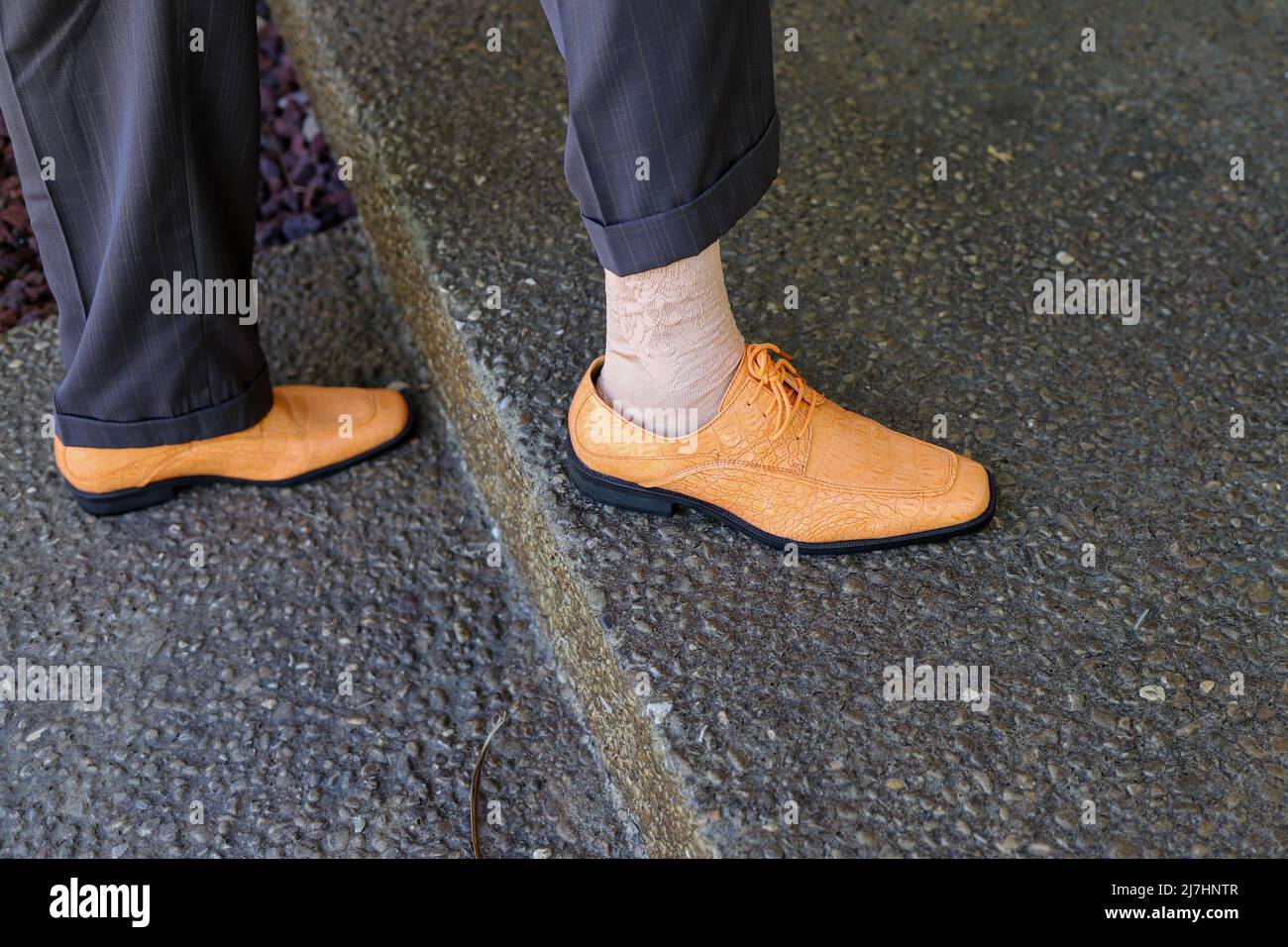 Low Section Of  Man  Wearing Dress  Shoes Stock Photo