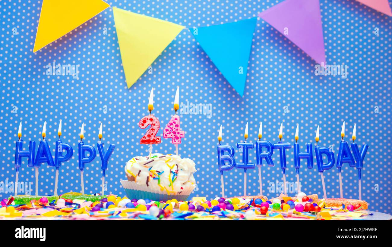 Happy birthday candle letters with a number or digit on a beautiful