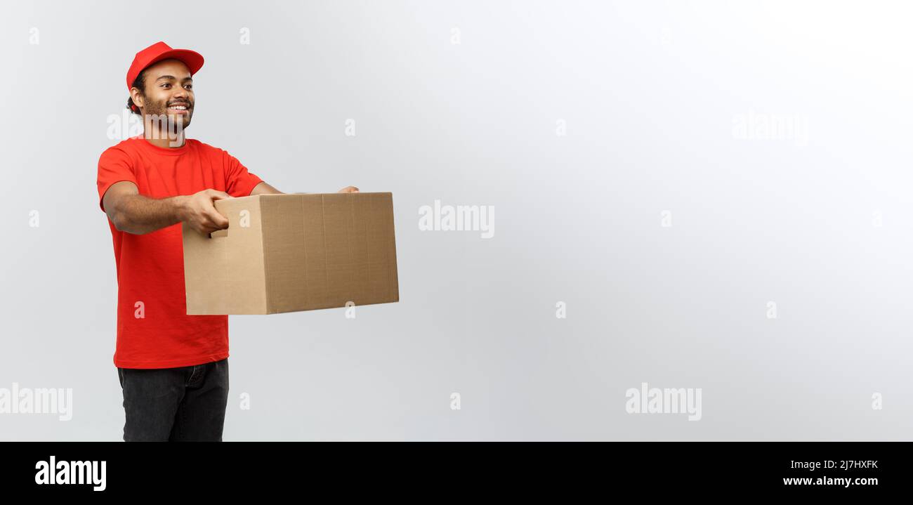 Delivery Concept Portrait of Happy African American delivery man in