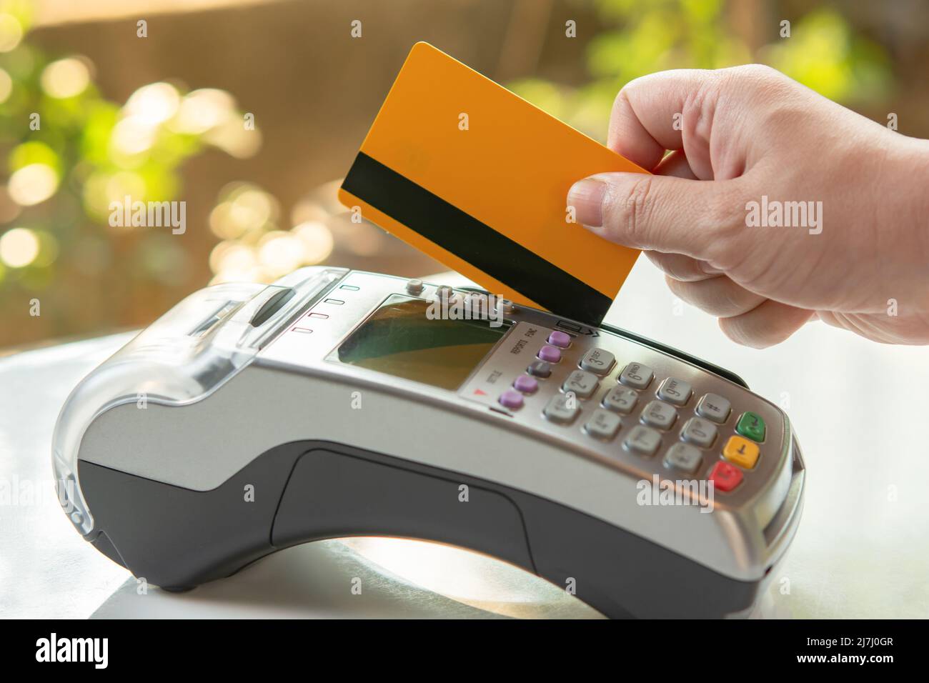 Paying for services by credit card on EDC machine or credit card ...