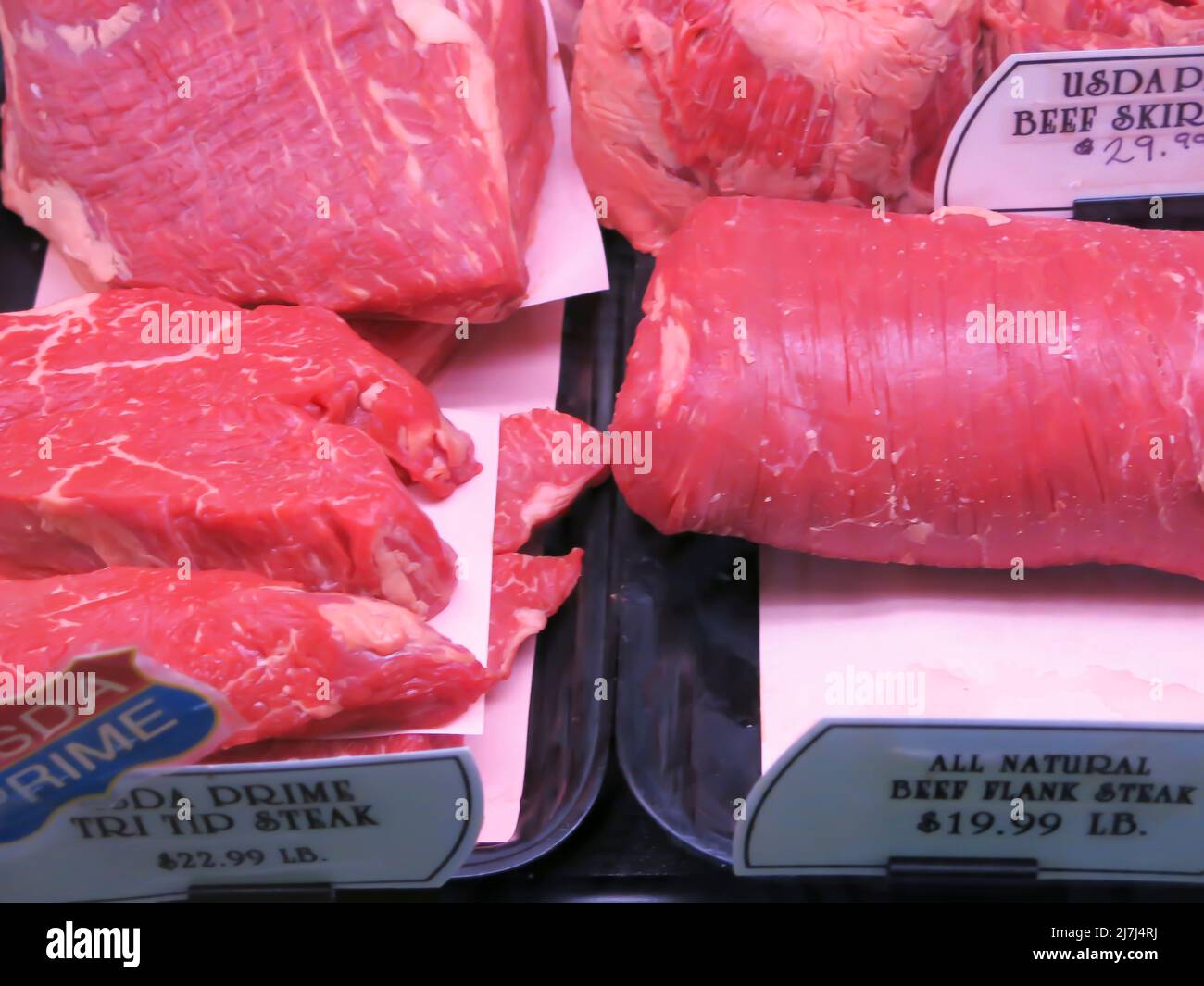 Meat on Display at Market that are Ready for Purchase Stock Photo