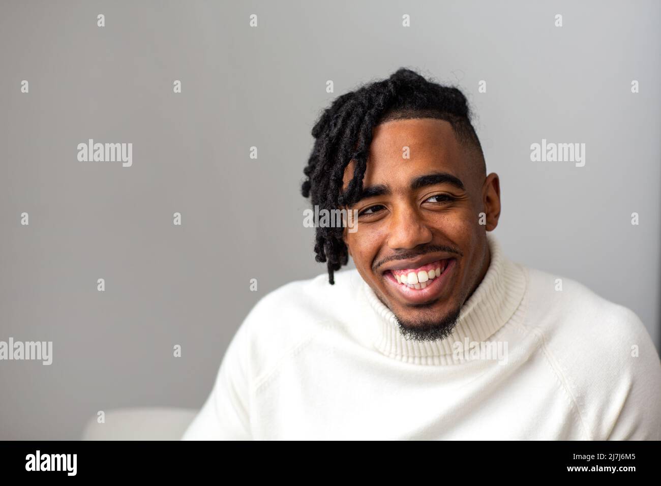 Portrait of A Young African American Man Smiling Stock Photo