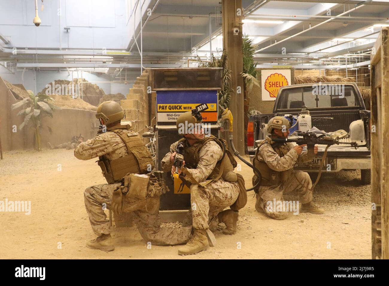 U.S. Marines with 2nd Air Naval Gunfire Liaison Company, II Marine Expeditionary Force Information Group, conduct infantry immersion training (IIT) at Camp Lejeune, North Carolina, May 5, 2022. IIT is a mixed reality training facility for small units, where they are put in realistic scenarios by role players who test the Marines’ skills. (U.S. Marine Corps photo by Lance Cpl. Elijah D. Hurtado) Stock Photo