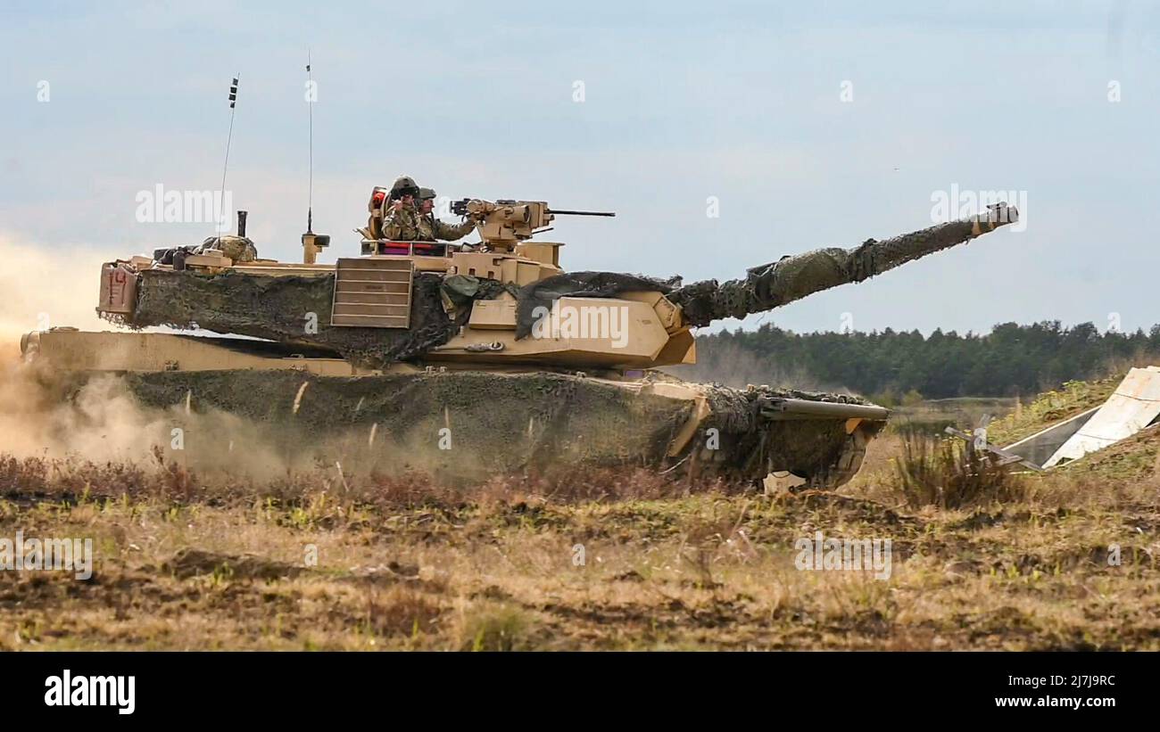 U.S. Soldiers with 1st Battalion, 68th Armor Regiment, 3rd Armored Brigade Combat Team, 4th Infantry Division (3/4th ABCT) maneuver during platoon situational exercises, Drawsko Pomorskie, Poland, May 4, 2022, as the unit prepares for their participation in Defender 22. The 3/4th ABCT is among other units assigned to V Corps, America’s forward deployed corps in Europe that works alongside NATO allies and regional security partners to provide combat-credible forces. (U.S. Army photo by Capt. Tobias Cukale) Stock Photo