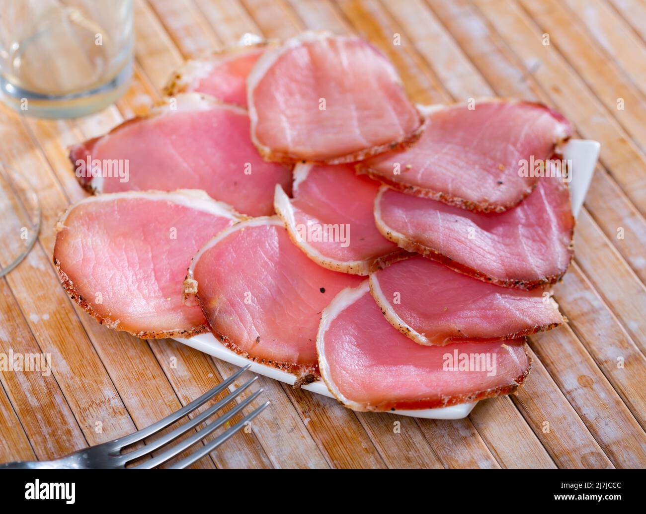 Thinly sliced cured pork sirloin meat Stock Photo Alamy
