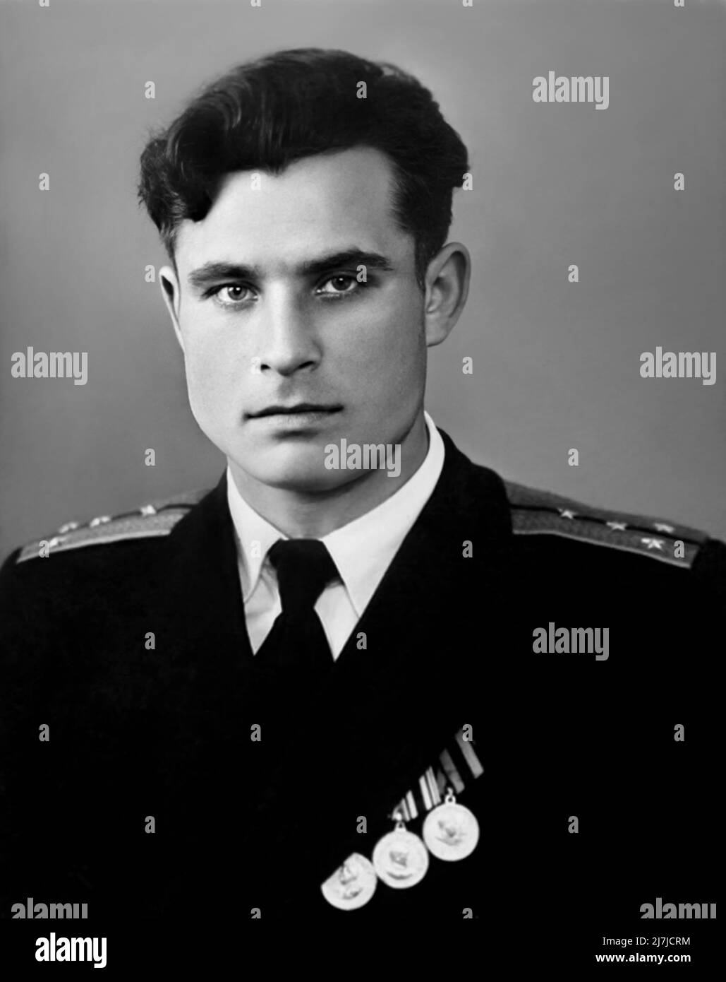 1955 , 17 february , RUSSIA : The communist military Soviet Navy officer hero VASILI ARKHIPOV ( Vasily Vasilij Aleksandrovic , 1926 - 1998 ). Was a Soviet Navy officer credited with preventing a Soviet nuclear launch ( and, potentially, all-out nuclear war ) during the Cuban Missile Crisis . Such an attack likely would have caused a major global thermonuclear response . As flotilla chief of staff and second-in-command of the diesel powered submarine B-59, Arkhipov refused to authorize the captain's use of nuclear torpedoes against the United States Navy, a decision requiring the agreement of a Stock Photo