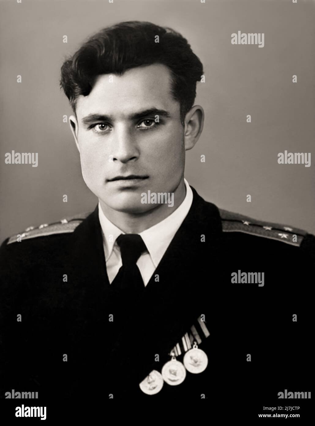 1955 , 17 february , RUSSIA : The communist military Soviet Navy officer hero VASILI ARKHIPOV ( Vasily Vasilij Aleksandrovič , 1926 - 1998 ). Was a Soviet Navy officer credited with preventing a Soviet nuclear launch ( and, potentially, all-out nuclear war ) during the Cuban Missile Crisis . Such an attack likely would have caused a major global thermonuclear response . As flotilla chief of staff and second-in-command of the diesel powered submarine B-59, Arkhipov refused to authorize the captain's use of nuclear torpedoes against the United States Navy, a decision requiring the agreement of a Stock Photo