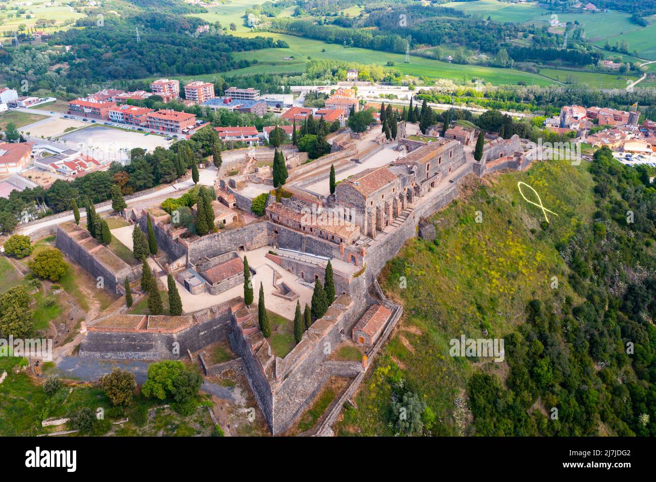Aerial view of medieval fortress on hill in Hostalric village, Spain ...