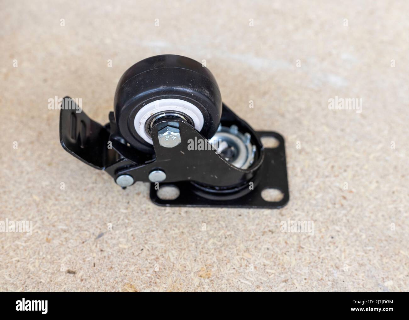 Furniture wheel with lock button Stock Photo Alamy