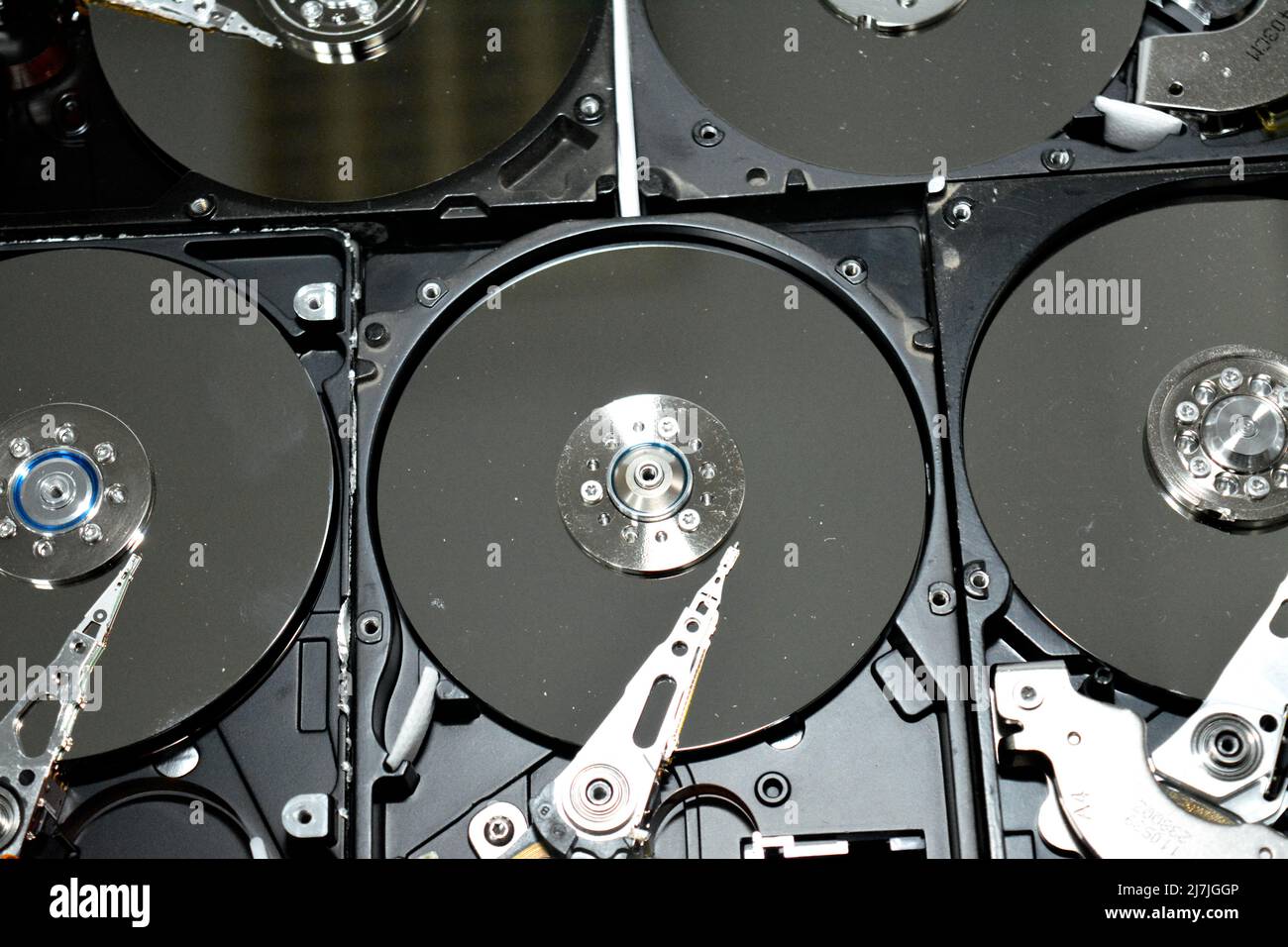 Disassembled computer hard disk drive storage memory with platters