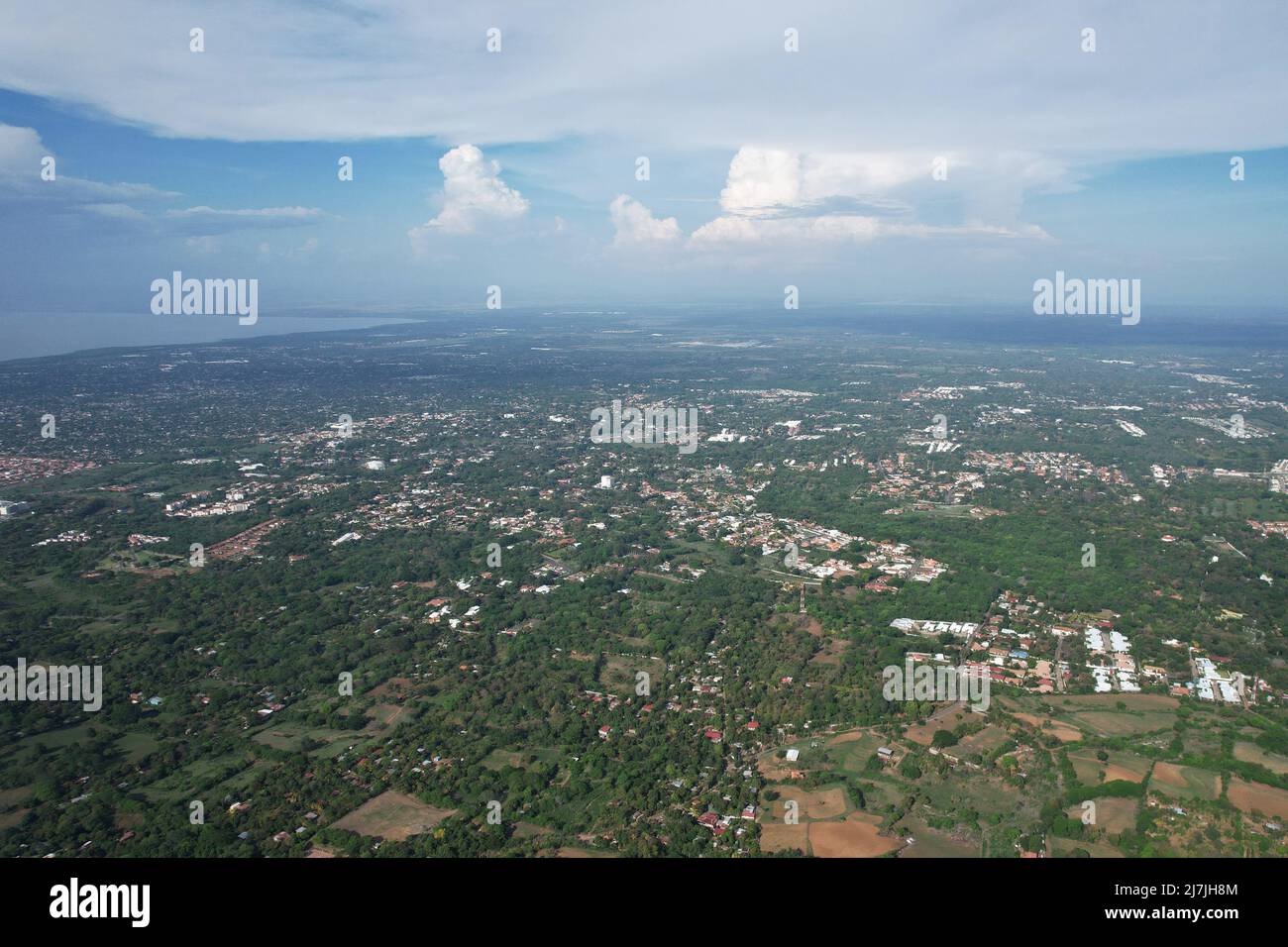 Green fields of Managua city aerial drone view Stock Photo
