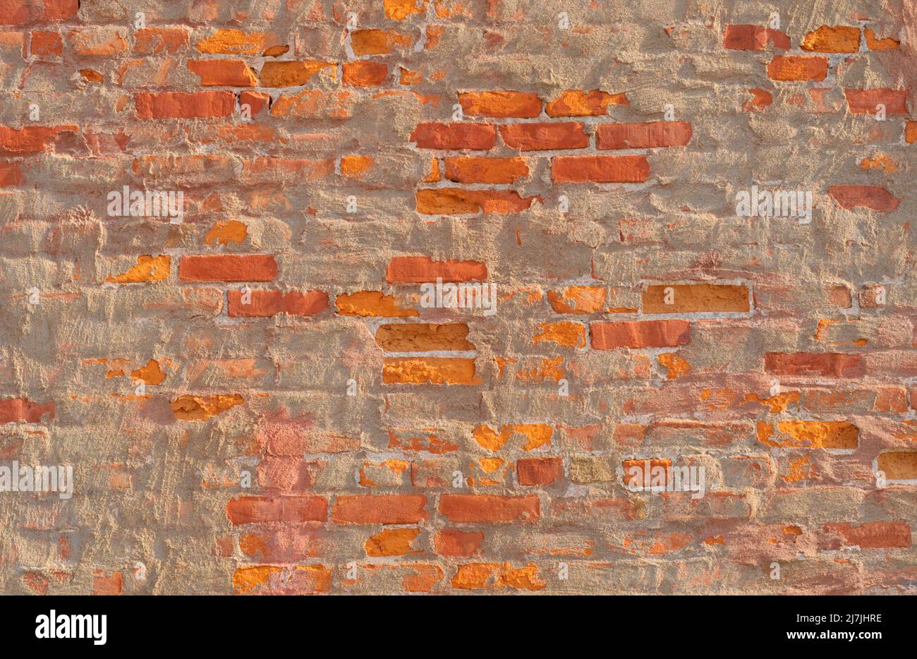 Weathered brick and stucco building facade Stock Photo Alamy