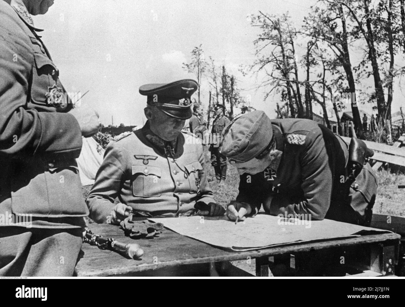 Günther Adolf Ferdinand von Kluge, a German field marshal during World War II who held commands on both the Eastern and Western Fronts, meeting with generals during Operation Barbarossa. He commanded the 4th Army of the Wehrmacht during the invasion of Poland in 1939 and the Battle of France in 1940, earning a promotion to Generalfeldmarschall. Kluge went on to command the 4th Army in Operation Barbarossa (the invasion of the Soviet Union) and the Battle for Moscow in 1941. Stock Photo