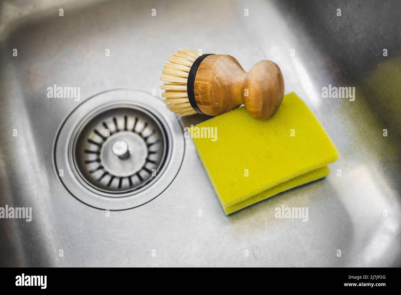 kitchen sink with disposable sponge vs durable reusable bamboo brush to