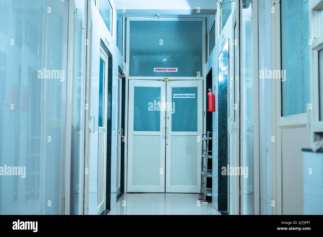 Empty shot of operation theater with rooms at hospital - concept of medical and healthcare services. Stock Photo