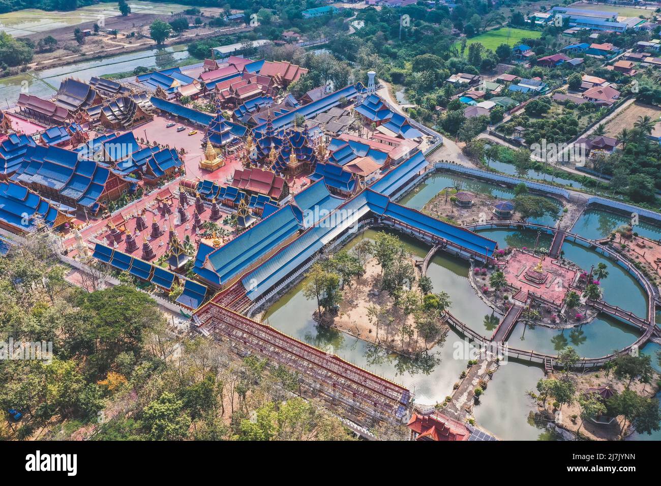 Aerial view of Wat Phiphat Mongkhon blue temple in Sukhothai, Thailand Stock Photo