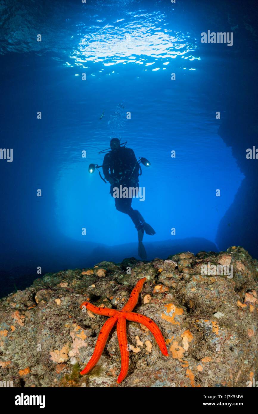 Scuba Diver inside Green Cave, Vis Island, Mediterranean Sea, Croatia Stock Photo