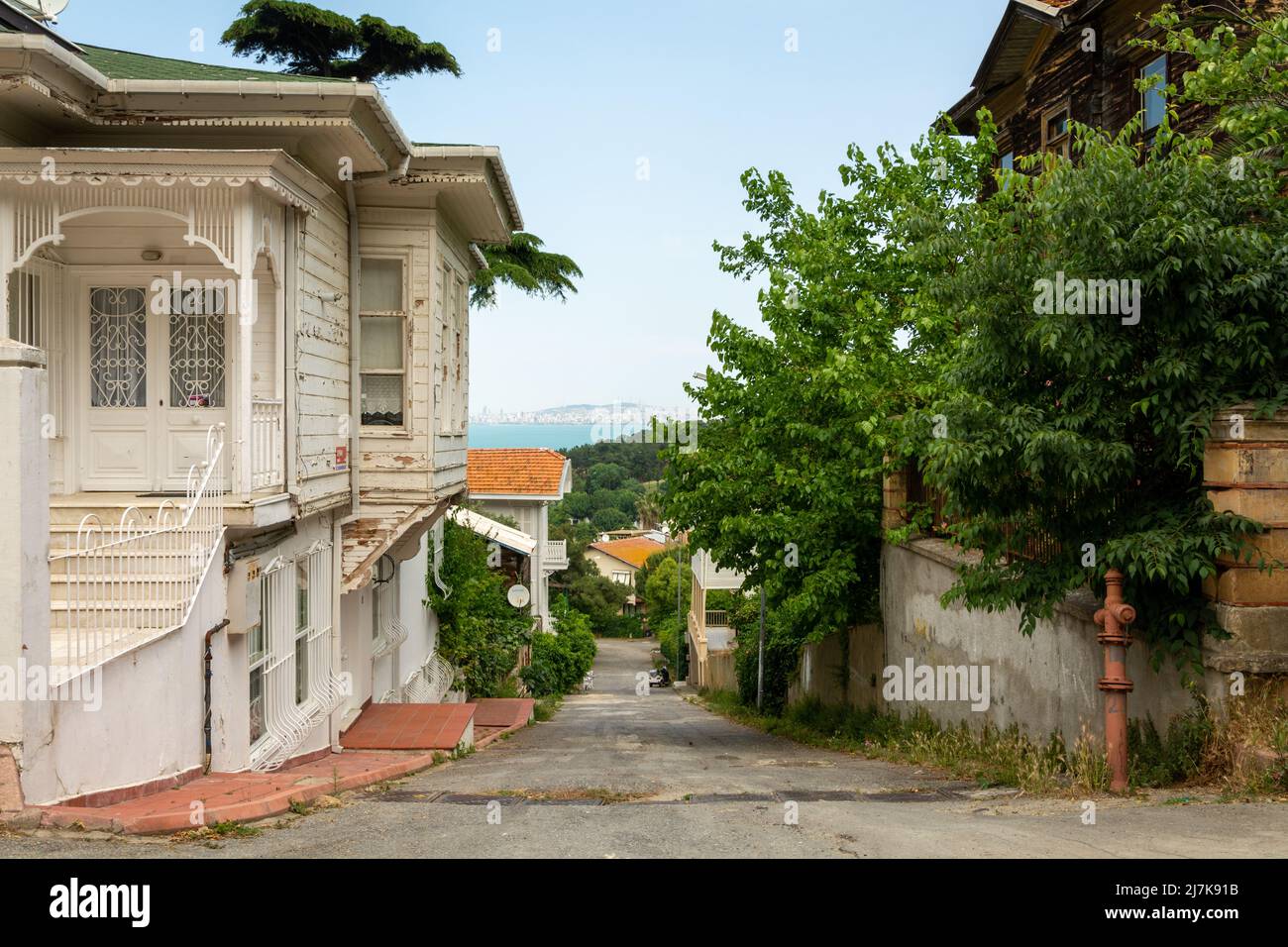 Local street and houses on the island of Heybeliada near Istanbul in Turkey. Stock Photo