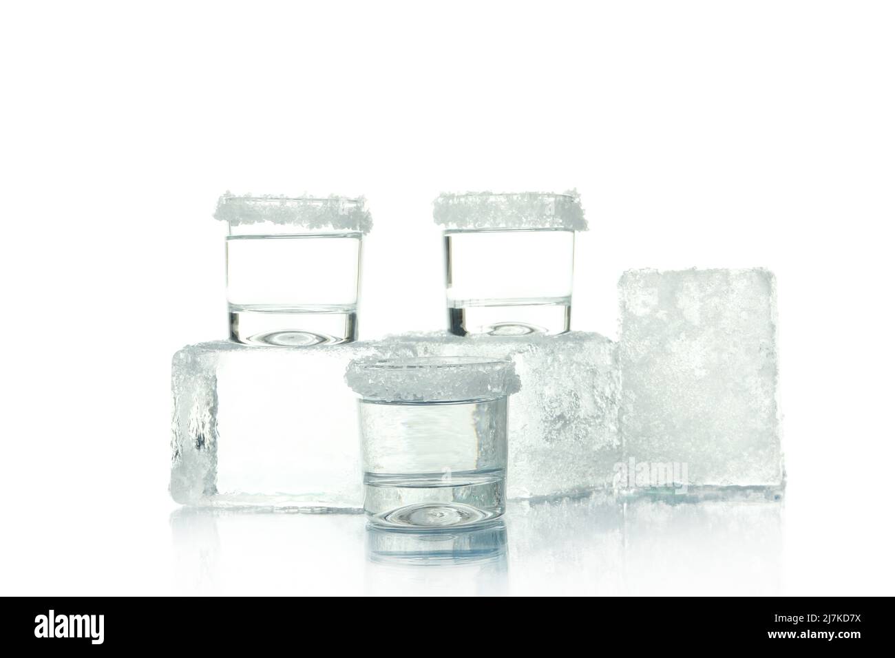Shots and ice isolated on white background Stock Photo - Alamy