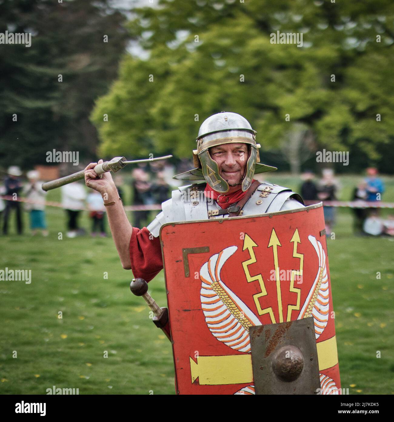 A Roman Legionary demonstrates throwing a pilum at the No Man's Land Event at Bodrhyddan Hall, Wales Stock Photo