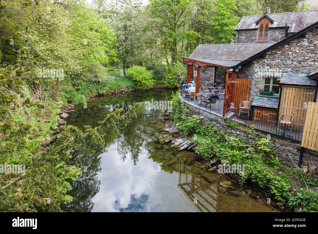 The tranquil settings of GrasmereTea Gardens by the river in Grasmere