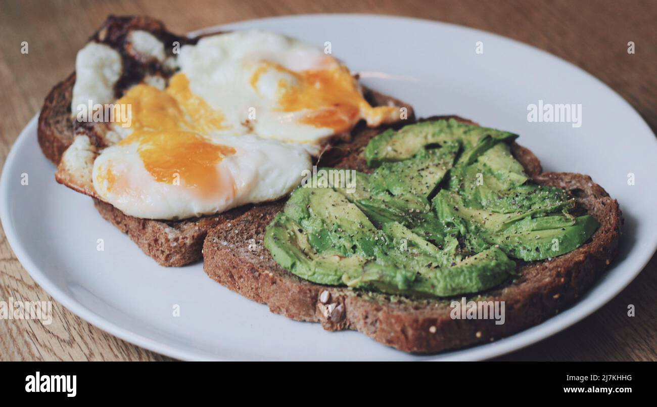 Egg and avocado on toast Stock Photo - Alamy