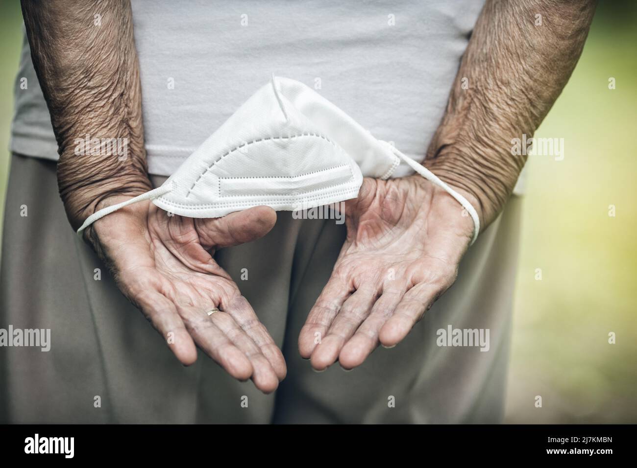 Elderly woman with a face mask during lockdown Stock Photo