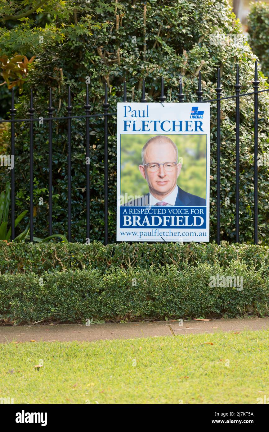 An electoral poster pinned to the front fence of a home in Kuring-Gai on Sydney's north shore for the Liberal Party candidate and current sitting member, Paul Fletcher in the 2022 Australian Federal Election. Mr. Fletcher has been the Minister for Communications, Urban Infrastructure, Cities and the Arts since December 2020 within the Morrison coalition government. Stock Photo