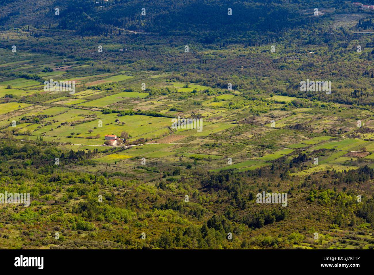 Fields and villages in Konavle region near Dubrovnik. Bird's-eye shot. Stock Photo