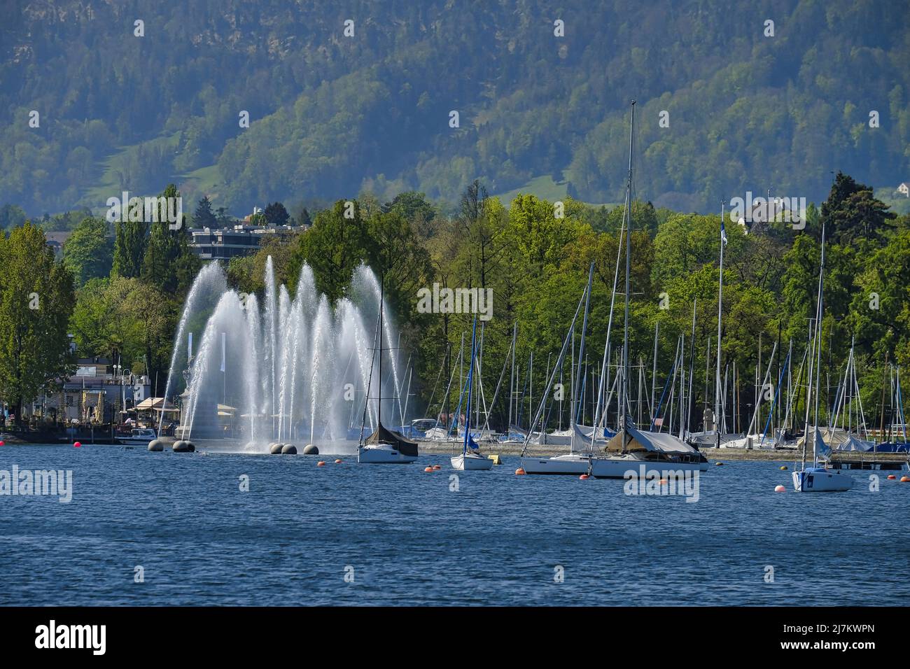 Ornamental fountain and yacht marina, Zurich, Lake Zurich, Switzerland Stock Photo